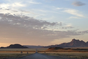 Road Sign Prints: Road through the Naukluft National Park in evening, Namibia, Africa