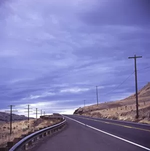Empty road with power poles on both sides, Eastern Washington State, United States of America