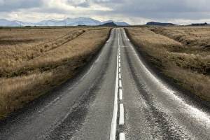 Snaefellsnes Peninsula Gallery: Road stretching away towards distant mountains, Snaefellsnes Peninsula, Iceland