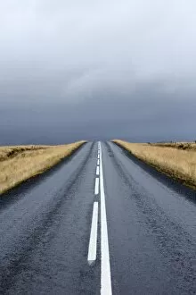 Snaefellsnes Peninsula Gallery: Road stretching away towards stormy sky, Snaefellsnes Peninsula, Iceland, Polar Regions