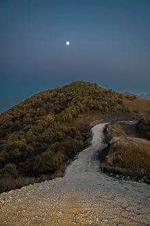 Terrain Prints: Road winding through mountains under moonlight in Chechnya, Caucasus region of Russia