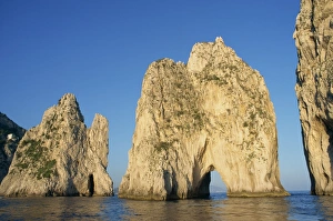 Capri Prints: Rock arches known as the Faraglioni Stacks off