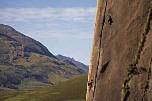 Images Dated 12th April 2008: Two rock climbers making their way up a very difficult route on the 450 metre monolith of Karimbony