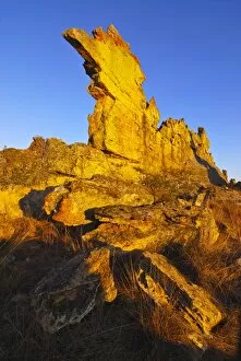 Rock formation shimmering golden at sunset in the Isalo National Park, Madagascar, Africa