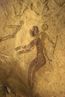 Rock Art Prints: Rock paintings of decorated woman and children on cave, Tassili n Ajjer