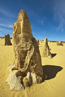 Rock pillars formed by erosion of thick hard layer of calcrete over soft limestone