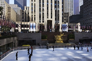 Ice Rink Prints: The Rockefeller Center with famous ice rink in the Plaza
