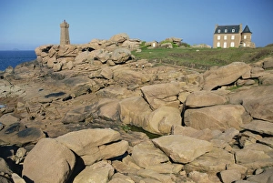 Cotes Damor Prints: Rocks on the coast and the lighthouse at Ploumanach, on the Cote de Granit Rose