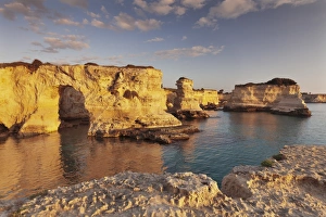 Salentine Peninsula Prints: Rocky columns, natural monument, rocky coast at sunrise, Sant Andrea, Adriatic Sea