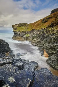 United Prints: Rocky cove where Rocky Valley meets the Atlantic Ocean near Boscastle in Cornwall during cloudy weather