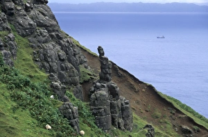 Rocky east coast of Trotternish and passing boat