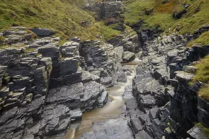 Gorge Prints: Rocky gorge in a valley near Boscastle reveals winding stream and rugged terrain in Cornwall