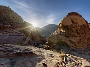 Wadi Rum Prints: Rocky mountains with the sun star in the Wadi Rum, Jordan, Middle East