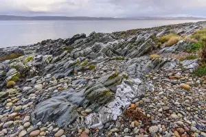 Pebble Prints: Rocky shore near Pirnmill looking out across the Kilbrannan Sound to Mull of Kintyre