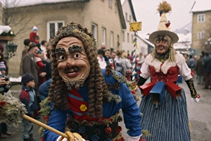 Masked Prints: Roller and Scheller (female and male), Fasnacht carnival, Imst, Austria, Europe