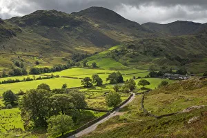 Rolling farmland and mountains in Little Langdale, Lake District National Park, UNESCO