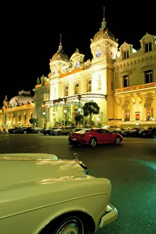 National Famous Place Prints: Rolls Royce and Ferrari parked in front of the Casino at night, Monte Carlo