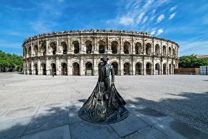 Sidewalk Prints: Roman amphitheatre, Nimes, Gard, Occitania, France, Europe
