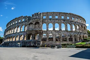 Roads Prints: Roman amphitheatre stands in Pula showing stone architecture and arches during a sunny day in Croatia