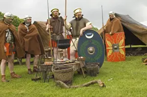 Soldier Prints: Roman soldiers of the Ermine Street Guard in encampment relaxing around the campfire