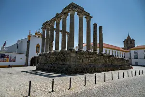 Columns Prints: Roman Temple of Evora stands tall in sunlight