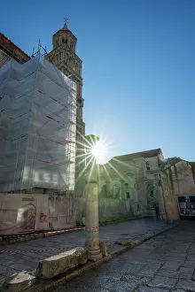 Artistry Prints: Romanesque bell tower of Cathedral of Saint Domnius with sunlight shining through scaffolding in Split