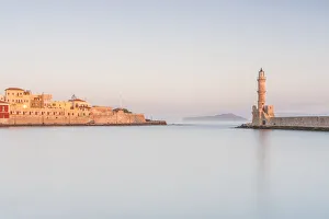 Romantic sky at dawn over the old fortress and lighthouse, Chania, Crete, Greek Islands
