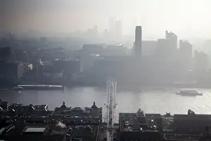 Hazy Prints: Rooftop view over River Thames and Millennium Bridge on a foggy day from St