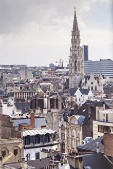 Brussels Prints: The rooftops and spire of the Town Hall in the background, Brussels, Belgium, Europe