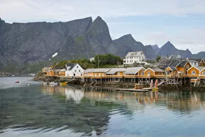 Rippled Gallery: Rorbu, traditional fishing huts used for tourist accommodation in village of Reine