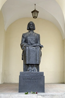 Lithuanian Prints: Rose placed at the foot of the statue of Donelaitis 1714-1780