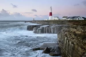 Lighthouse Gallery: Rough seas crash over rocks near Portland Bill Lighthouse, Dorset, England, United Kingdom
