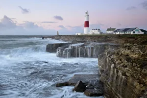 Guidance Gallery: Rough seas crash over rocks near Portland Bill Lighthouse, Dorset, England, United Kingdom