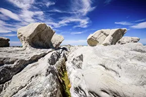 Rounded Prints: Rounded Coastal Rock Structures on Bleached Limestone Beds at Ward Beach