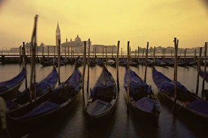 Ocean Water Prints: Row of gondolas at dawn