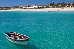 Wooden Boat Prints: Rowboat in blue sea off coast, Santa Maria, Sal, Cape Verde Islands, Atlantic, Africa