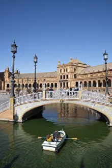 Rowing Prints: Rowing boat on the canal of Plaza de Espana, Seville, Andalusia, Spain, Europe