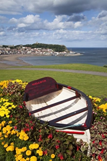 Rowing Boat Prints: Rowing boat and flower display at South Cliff Gardens