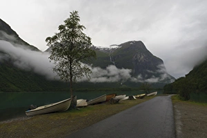 Rowing Boats Prints: Rowing boats, lake, mountains and low cloud, Lovatnet Lake, Norway, Scandinavia, Europe