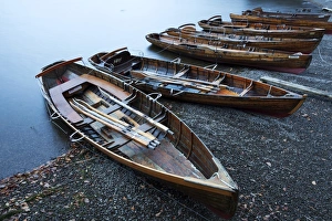 Rowing boats on the Lakeshore, Derwentwater, Keswick, Lake District National Park, Cumbria, England, United Kingdom, Europe