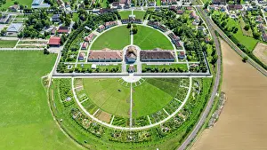 Center Prints: Royal Saltworks at Arc-et-Senans in France showing its circular layout and surrounding land