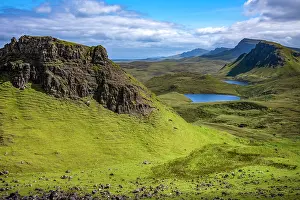 Trotternish Prints: Rugged hills and lakes of Trotternish escarpment in Isle of Skye Scotland under clear skies