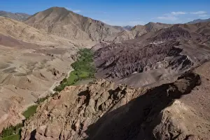 Contrasts Prints: Rugged landscapes and green patchwork fields near Shahr-e Zohak, Afghanistan, Asia