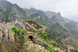 Northern Prints: Ruins of colonial fortress on mountain ridge overlooking valleys in Northern Vietnam