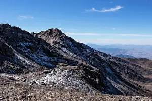 Iconic Prints: Ruins of a high-altitude building in snow at Sierra Nevada National Park in Spain