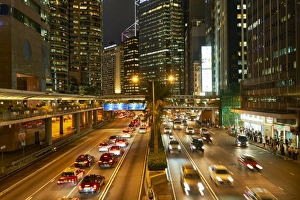 Blurry Prints: Rush hour traffic in Central, Hong Kong Island, Hong Kong, China, Asia