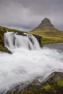 Kirkjufellsfoss Prints: Rushing glacial run-off feeds Kirkjufellfoss on the Snaefellsness Peninsula, Iceland