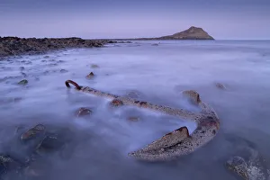 Anchor Prints: Rusted anchor from a shipwreck near Worms Head on the Gower, Wales, United Kingdom