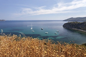 Sailboats in the turquoise sea, Sant Andrea Beach, Marciana, Elba Island, Livorno Province