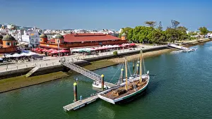 Cafes Prints: Sailing boat near market in Olhao